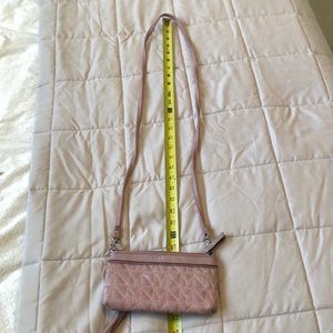 Cute gently used clutch with removable cross body strap -